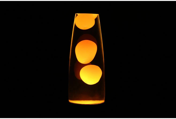 The orange wax of Lava Lume glowing in the dark