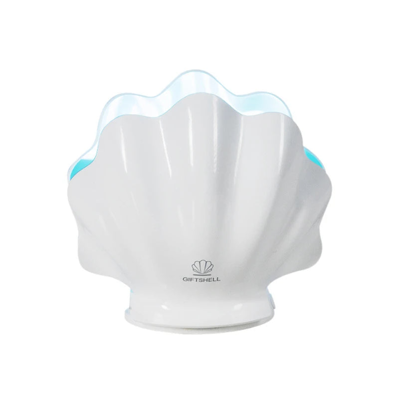 Shell Lume, a white seashell lamp, switched off